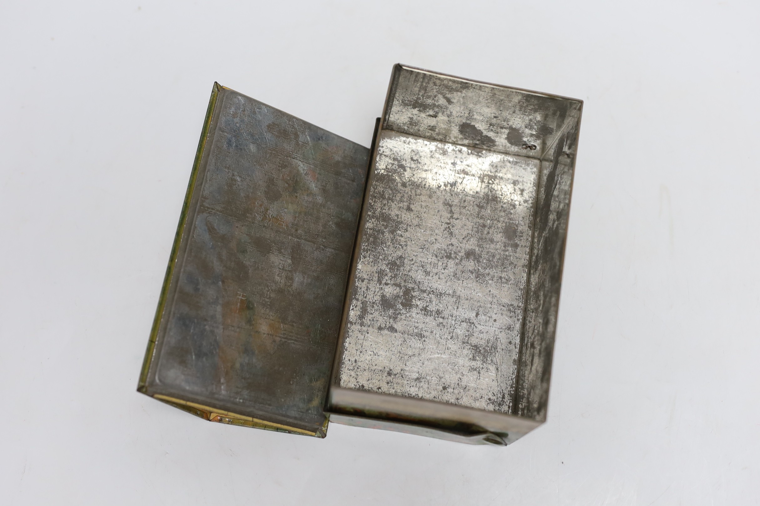 Britains farm series, a Schuco type monkey and a Huntley & Palmers novelty farmhouse biscuit tin, 16cm wide